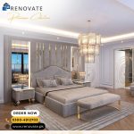 King sized bed with side tables, bed wall and settee